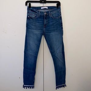 Size 4 medium wash Zara jeans with silver hem detailing.